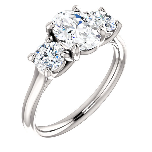 traditiona style three stone moissanite ring in white gold